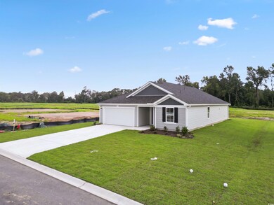 View of front facade featuring a garage and a fron