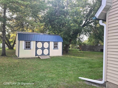 244 S Sherman St, Vassar, MI 48768 - photo 5