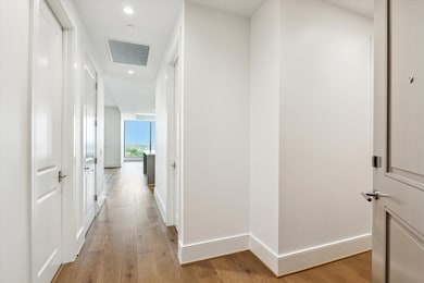 Through the foyer/entry we welcome you into this elegant 12th floor unit with spectacular Northern views