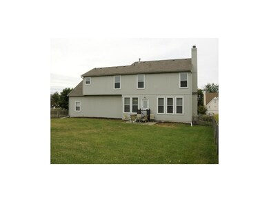 Large, fenced backyard with patio. Just steps from