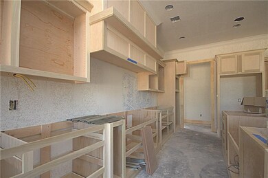 Open floorplan with the kitchen, eat-in area and l