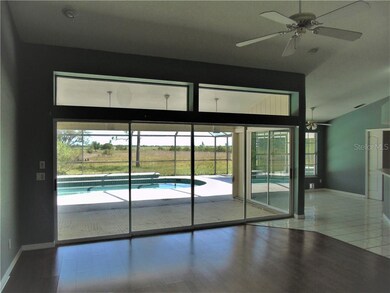 Living room view with recessed lighting.