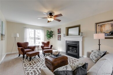 Family room with gas fireplace and lovely detailed mantel