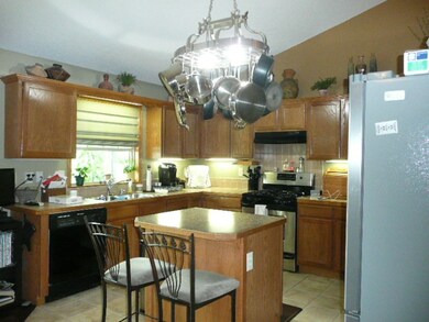 Gas range and refrigerator stay with home