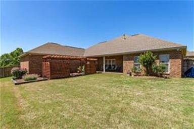 REAR VIEW OF HOME - GREAT LANDSCAPING IN REAR AND 