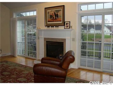 Family Room LOTS OF GLASS IN GREAT ROOM ADDS LIGHT