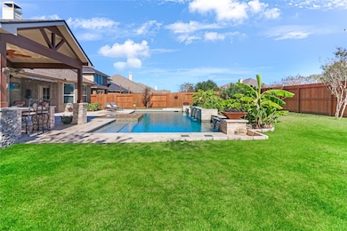 Spacious lot  provides room for a pool and green space and outdoor kitchen.