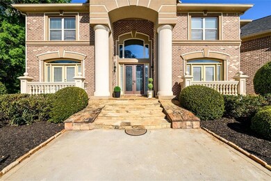 View of front of house with french doors and brick