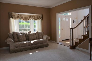 Formal living room just off the entry is spacious 