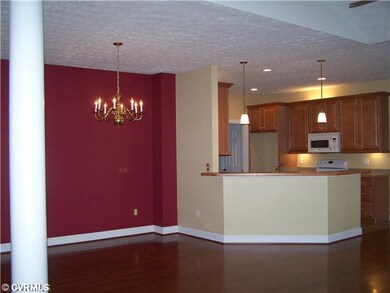 Exterior Front - View of dining area to kitchen