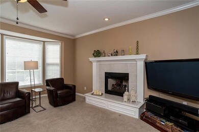 Nice fireplace and lots of natural light!