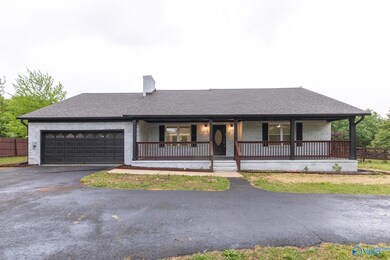 This beautifully updated 1,873 sq ft home welcomes you with a wide front porch, fresh exterior paint, and a spacious garage!