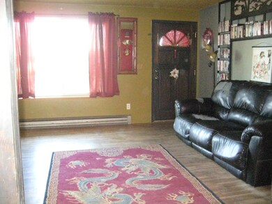 Spacious Living Rm with hardwood floors