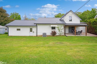 Rear of house with porch/patio