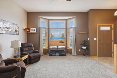 Living room has loads of natural light.