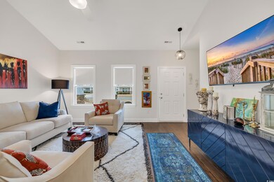 Living room featuring hardwood / wood-style floori