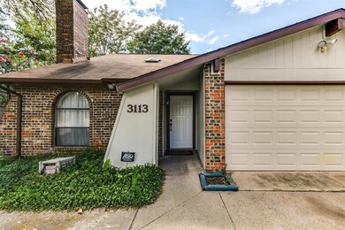 Entrance to property featuring a garage