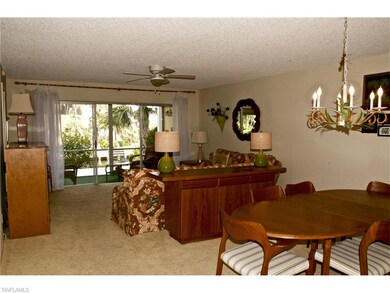 View of great room through the lanai to the water.