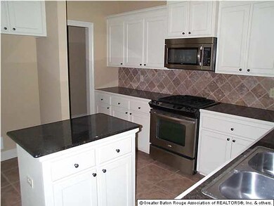 Granite counters kitchen.