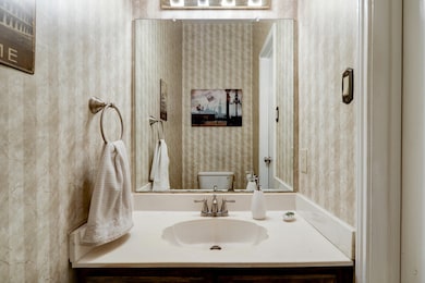 Half bath connected to living / dining area