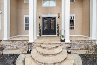 Doorway to property featuring french doors