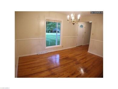 Formal dining room with neutral walls and beautifu