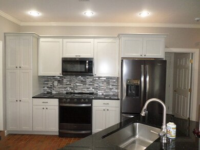 New Kitchen Cabinets, Granite Counter-top, Brick F