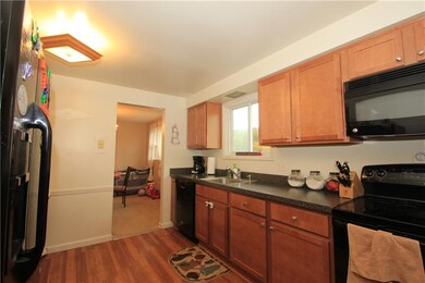 This alternate view of the kitchen provides a good