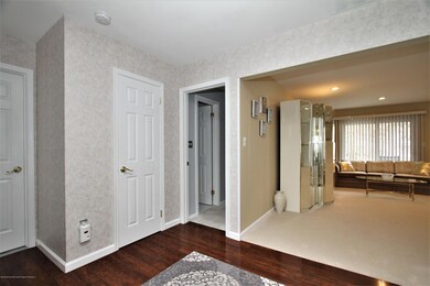 10 long foyer leads to living room