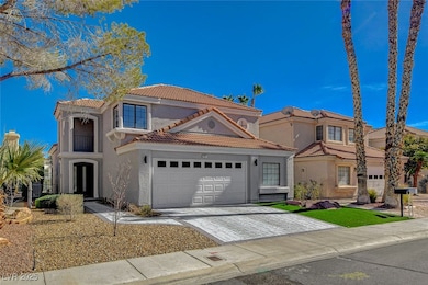 Mediterranean / spanish-style home featuring an at