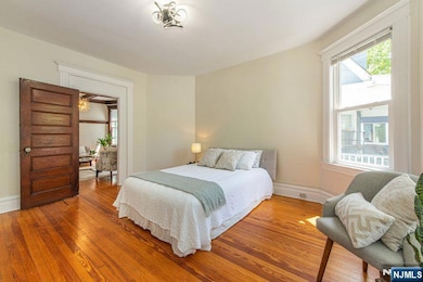 Bedroom 1- Queen bed for scale