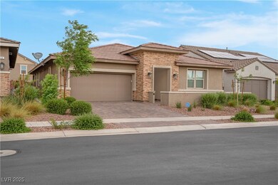 View of front of home with stucco siding, stone si