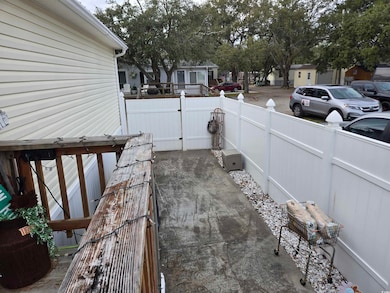 View of patio / terrace featuring fence
