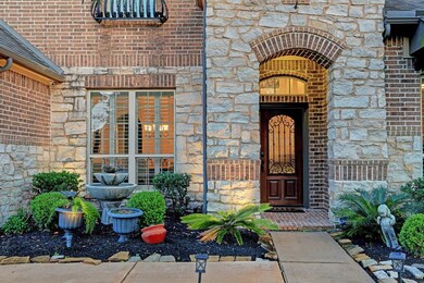 A charming covered front porch and solid wood front door with decorative wrought iron will welcome you and your guests. Take a look inside - you will not be disappointed!