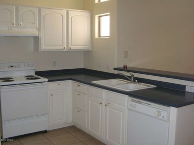 Kitchen with Corian Counters