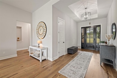 Foyer featuring hardwood / wood-style floors, a c