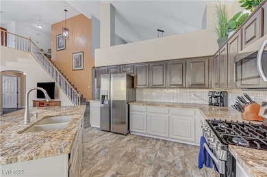 Kitchen with appliances with stainless steel finis
