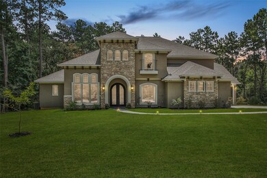 Welcome to your new home at 27418 Winding Creek. This graceful custom home sets on a 1.58 acre home site in a small town community just Northwest of Houston. Enjoy this rich rural atmosphere yet it is just minutes to schools, restaurants and shopping.