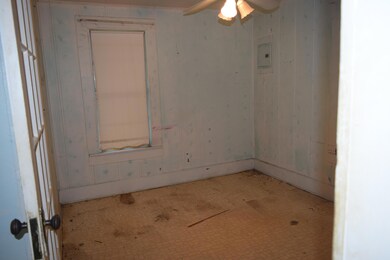 BEDROOM 1 LOOKING FROM FRONT DOOR