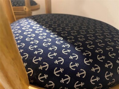 Nautical decorations included in this furnished condo
