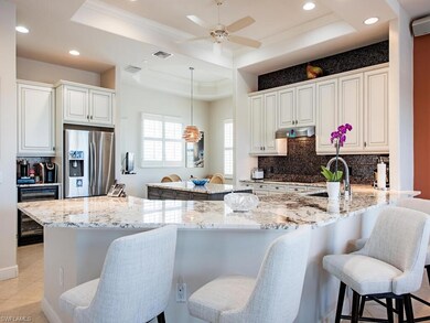 Countertops all one level now, and built-in pantry and wine cooler added! Choose from the breakfast nook or breakfast bar.