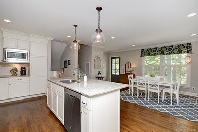 Updated kitchen with hardwood floors