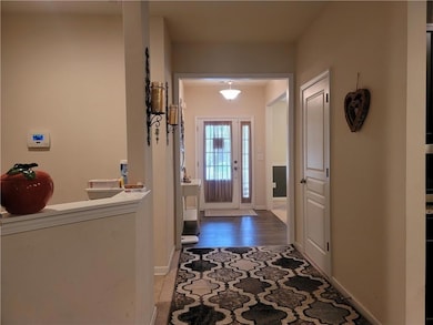 Foyer featuring baseboards