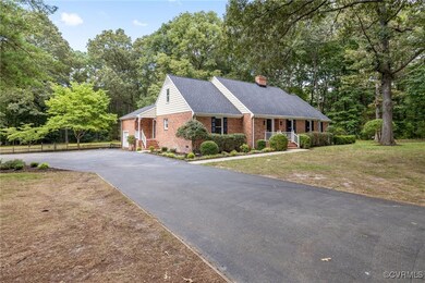 View of front of home with a porch and a front yar