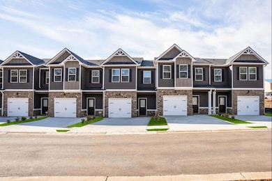 Multi unit property featuring an attached garage, 