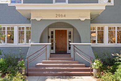 Entrance to property with stucco siding