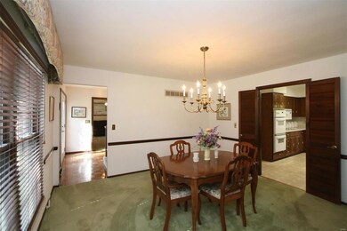 Double Doors open to Large Kitchen for easy access