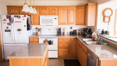 The kitchen is spacious and homey and the countert