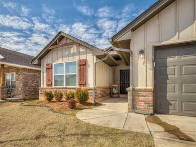 Doorway to property with a garage