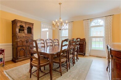 Palladian windows & a new chandelier enhance the b